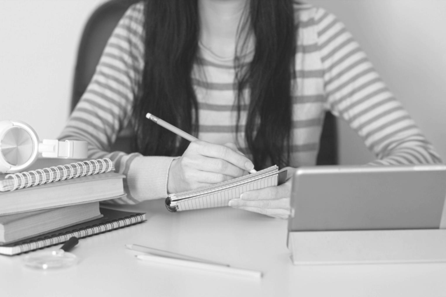 Calm workspace setup showing organized financial planning materials and stress management tools